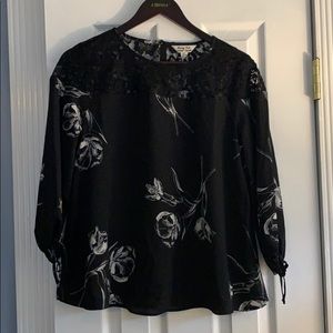 Black floral blouse